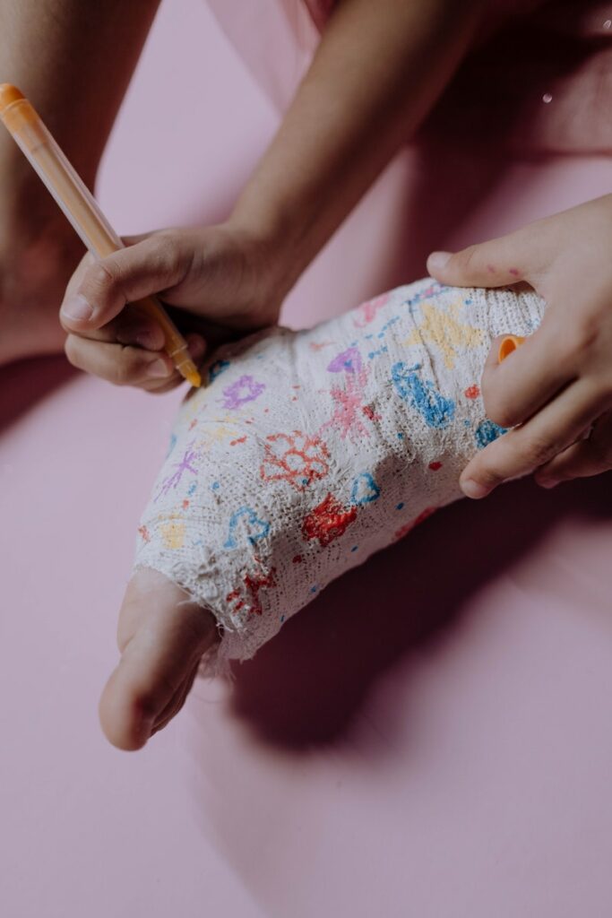 A Child Drawing on Orthopedic Cast